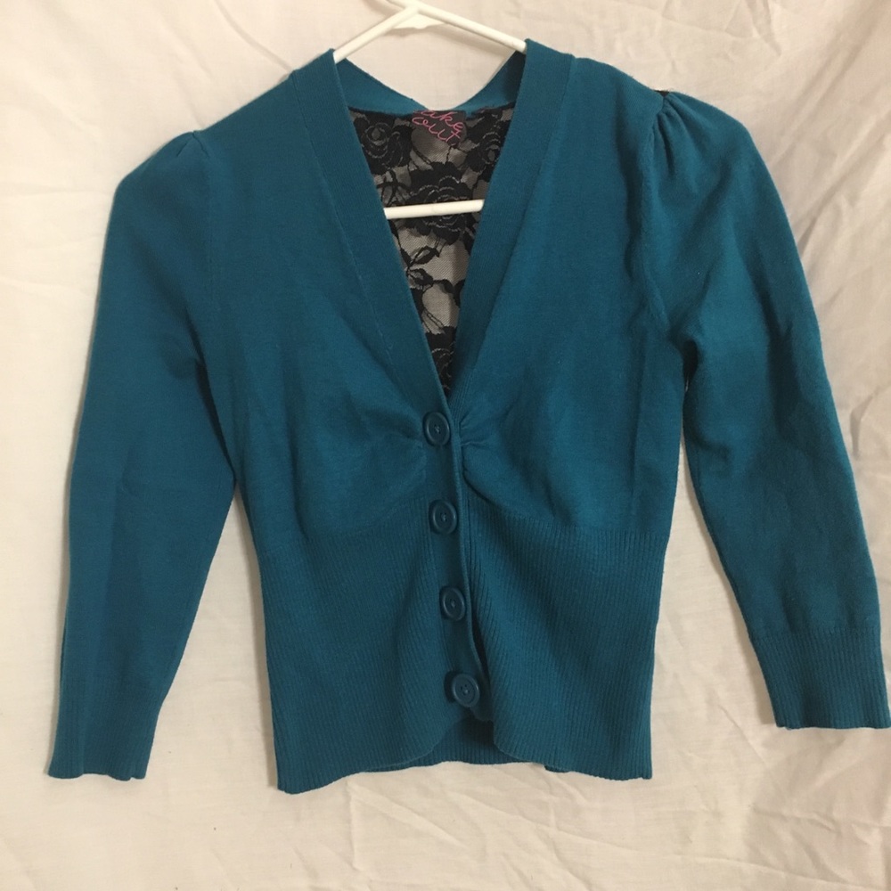 edgy, never worn, lace-back Take out sweater